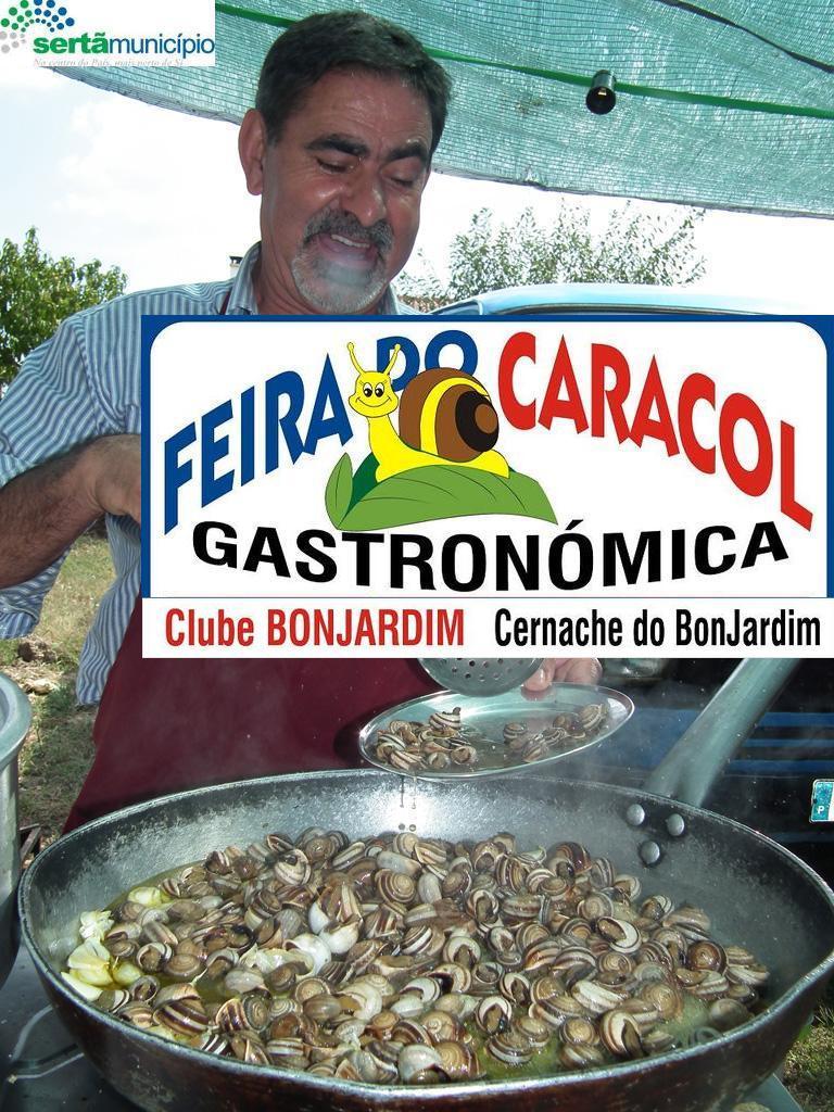 de casa às costas lá vem o “caracol de Cernache”